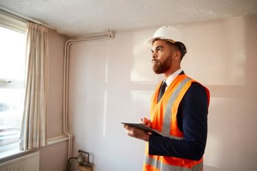 home inspector checking house interior