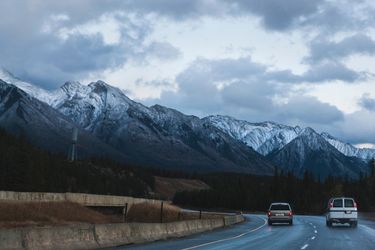 Cars driving through mountains