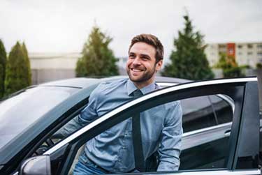 Man getting out of car