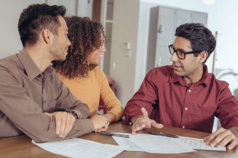 people looking at documents