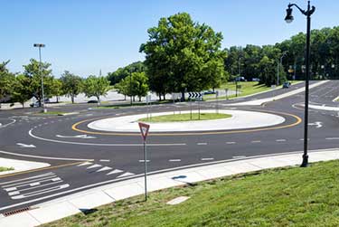 roundabout with green grass surronding it