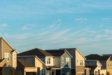 row of houses blue sky in the background