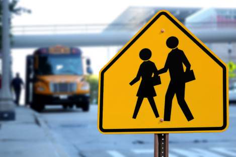school crossing zone sign