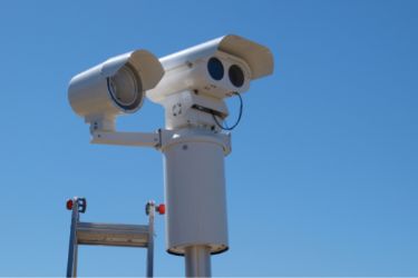 speed camera sign in safety zone crosswalk