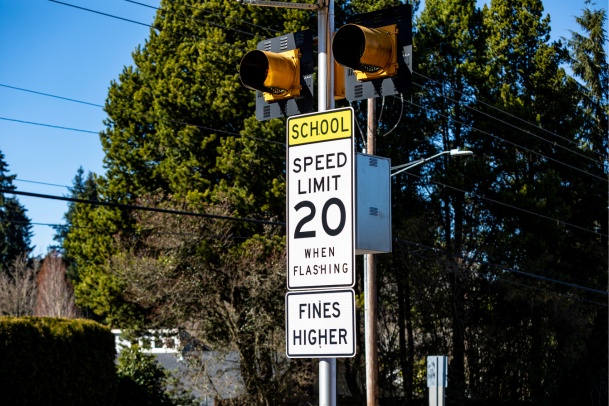 speed camera sign in safety zone crosswalk