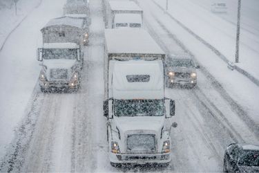 vehicles driving on the highway in winter