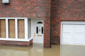 House being damaged from flood