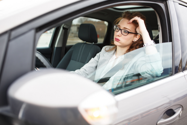 woman sitting in traffic jam